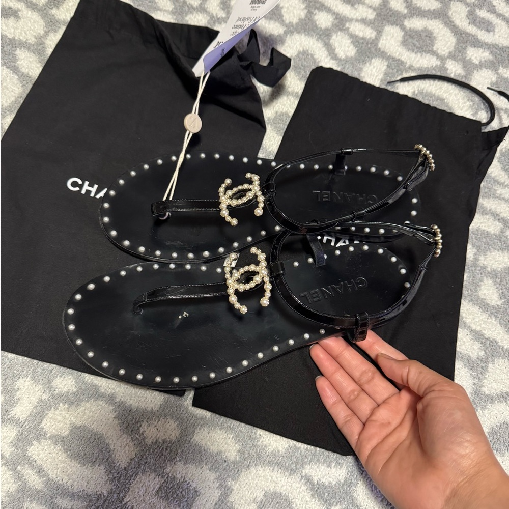 CHANEL Black Sandals with Pearl Embellishments